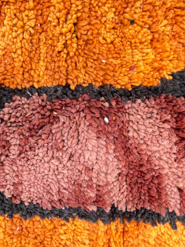 Abstract color block Moroccan wool rug with bold orange, red, green, and purple geometric design