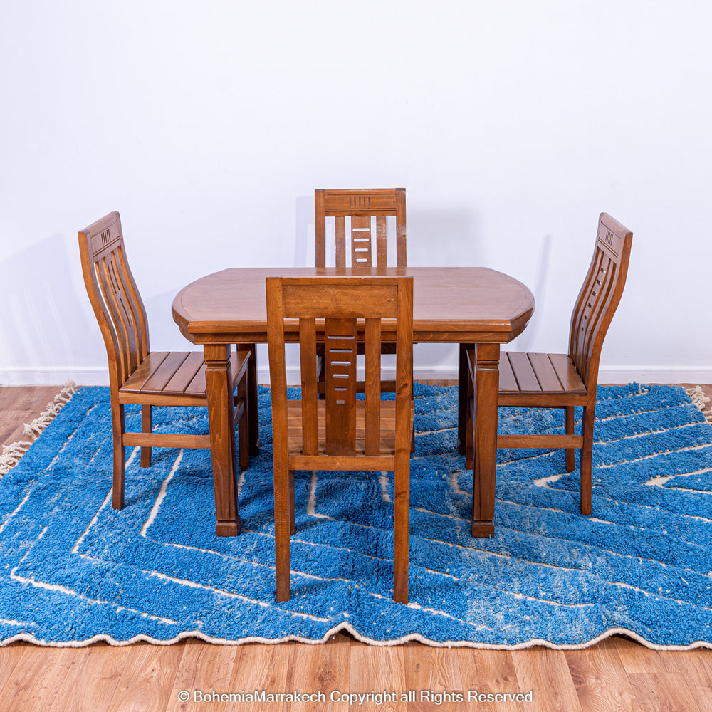 Multicolored Moroccan Boujaad Rug handmade with wool, featuring vibrant pink, yellow, and blue Berber patterns.