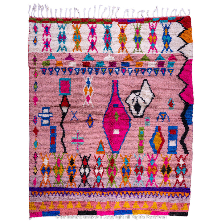 Handmade pink Boujaad Moroccan rug with colorful tribal and diamond motifs on wool