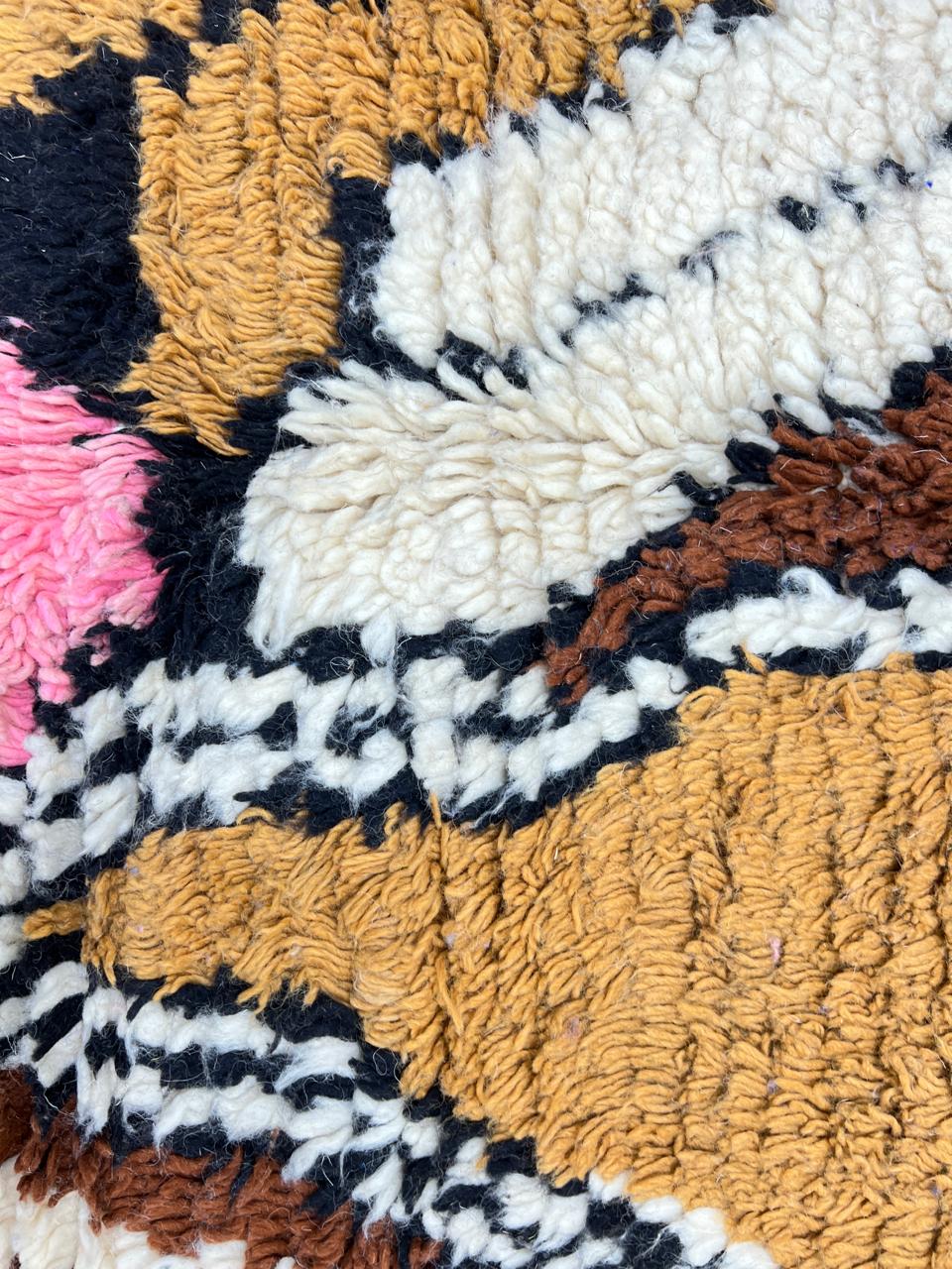 Colorful handmade Moroccan wool rug with abstract geometric pattern