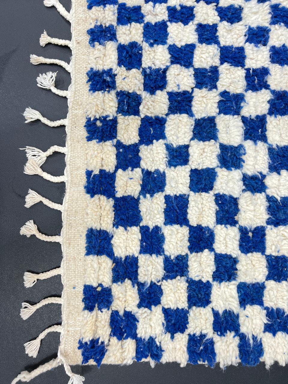 Handmade blue and white checkered Moroccan wool runner rug with geometric pattern