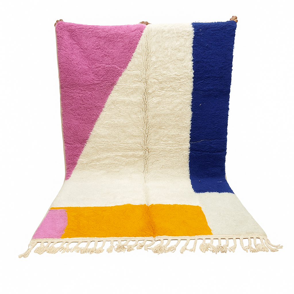 Colorful Moroccan wool rug with pink, blue, and yellow color block abstract design, handmade by Berber artisans