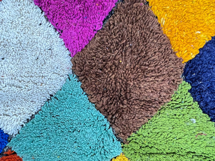 Handwoven colorful Moroccan wool runner rug with multicolor diamond pattern