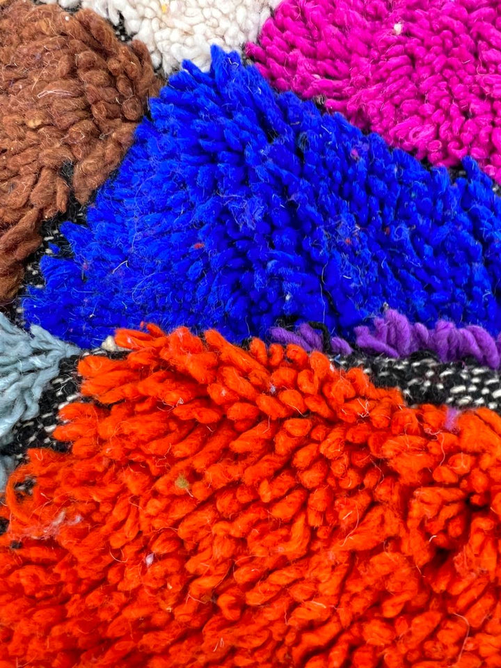 Handwoven colorful Moroccan wool runner rug with multicolor diamond pattern