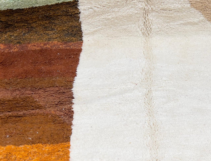 Handmade colorful Moroccan wool runner rug with geometric color-block design in green, pink, and orange tones