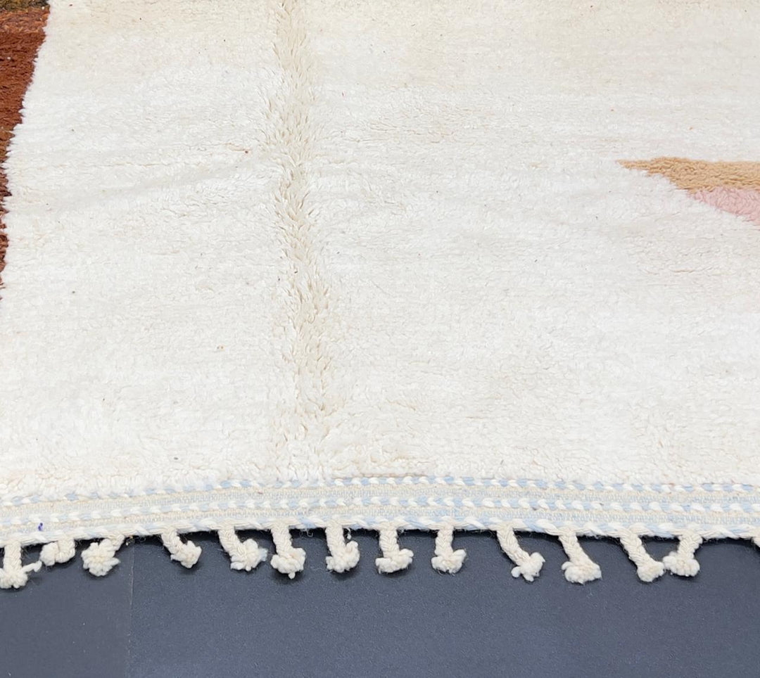 Handmade colorful Moroccan wool runner rug with geometric color-block design in green, pink, and orange tones