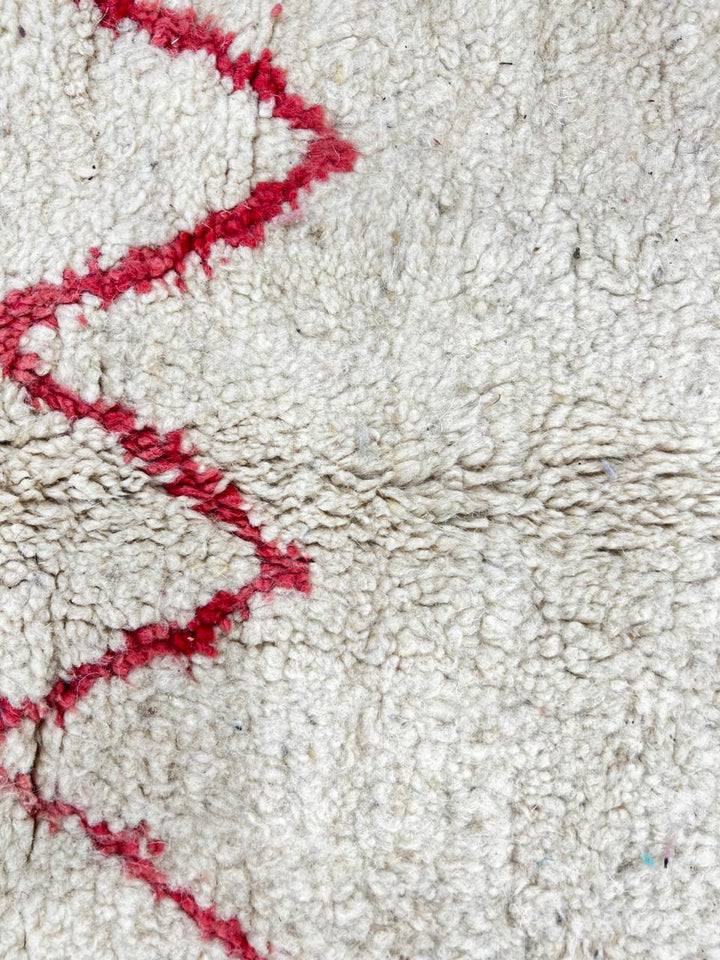 Handmade cream Moroccan wool rug with red and black geometric lines – modern Berber design