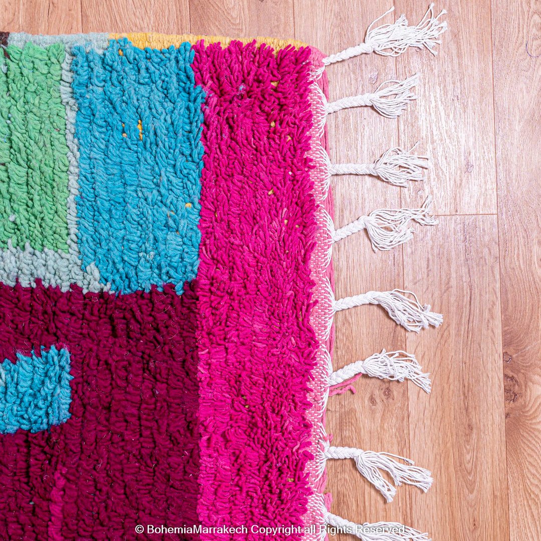Colorful handmade Moroccan Boujaad rug with abstract Berber motifs and bold colors