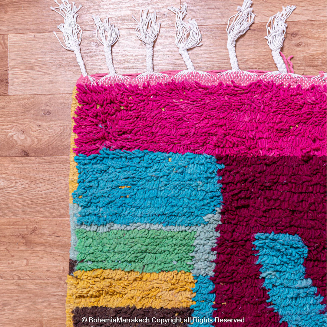 Colorful handmade Moroccan Boujaad rug with abstract Berber motifs and bold colors