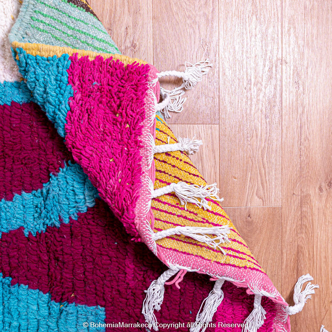 Colorful handmade Moroccan Boujaad rug with abstract Berber motifs and bold colors