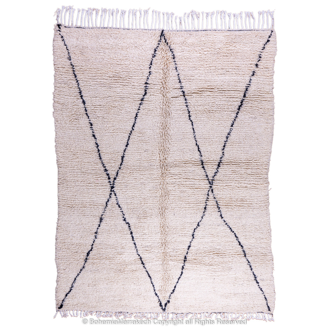 Handmade Beni Ourain Moroccan wool rug with black diamond design on cream background
