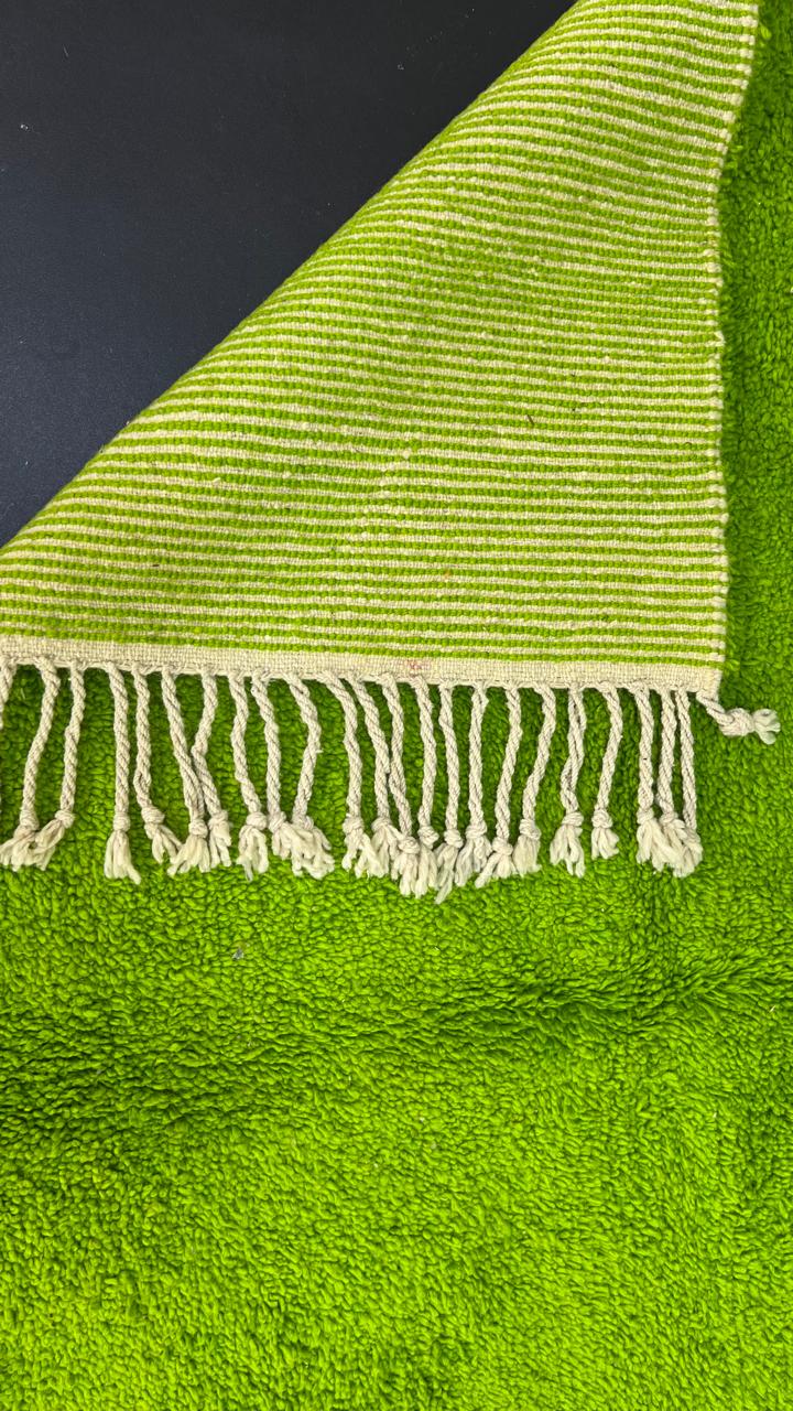 Green Moroccan runner rug in handmade wool shag texture with fringed ends