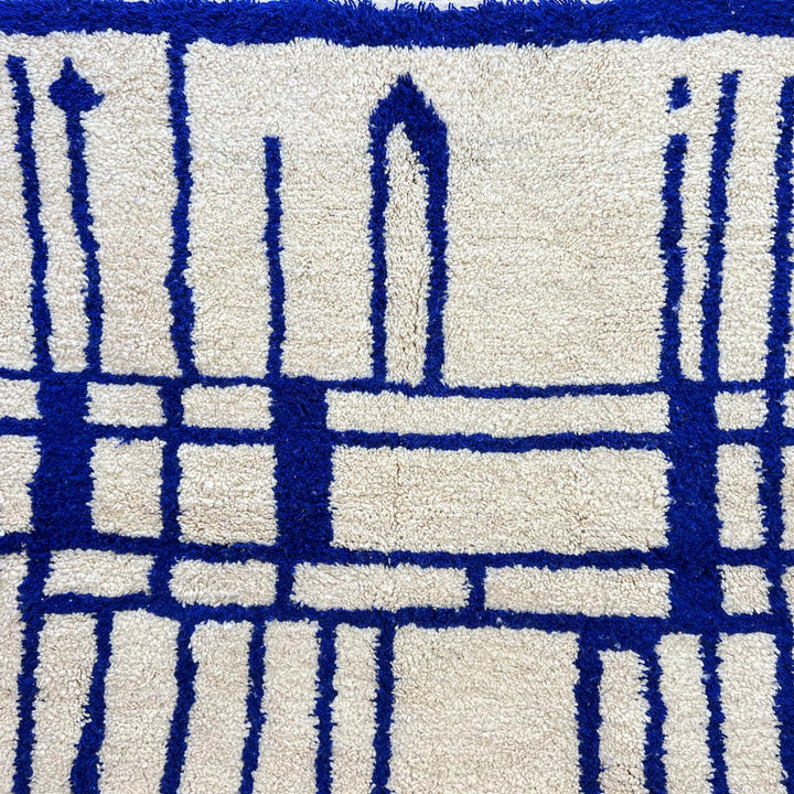 Handmade blue Moroccan Berber runner rug in wool with geometric pattern