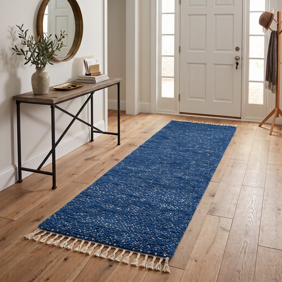Close-up of deep indigo blue Moroccan wool rug with natural ivory speckled texture