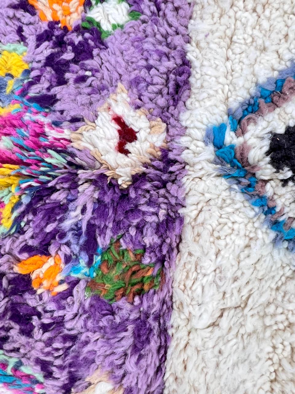Round ivory and brown Moroccan wool rug with colorful Berber diamond motifs, handmade Amazigh round area rug.