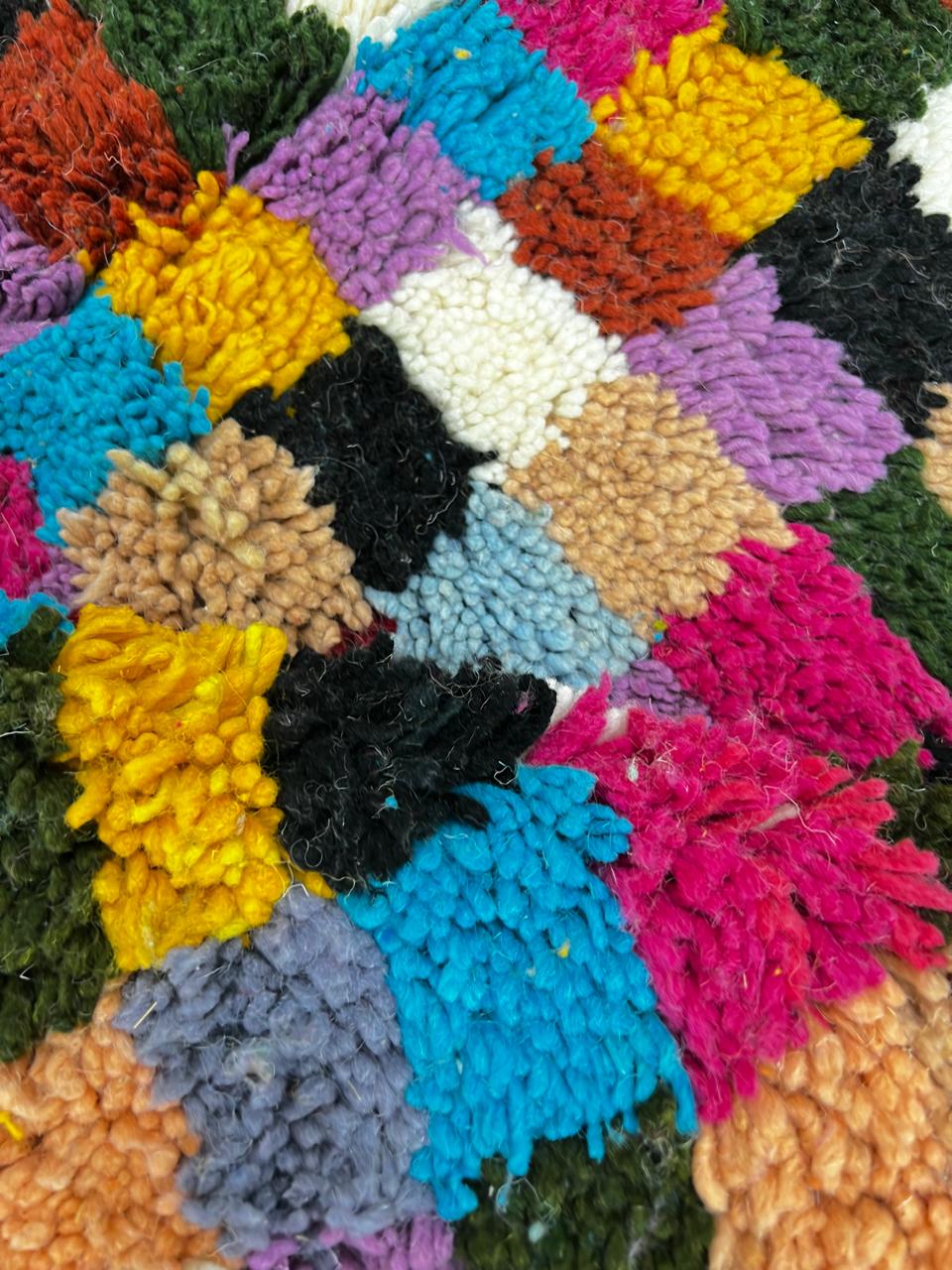 Round multicolor Moroccan checkered rug