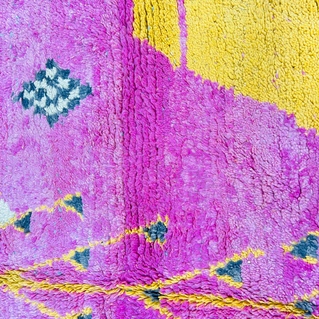 Vintage Moroccan rug with pink, yellow, and blue diamond patterns, handwoven Berber wool, 245x170 cm.