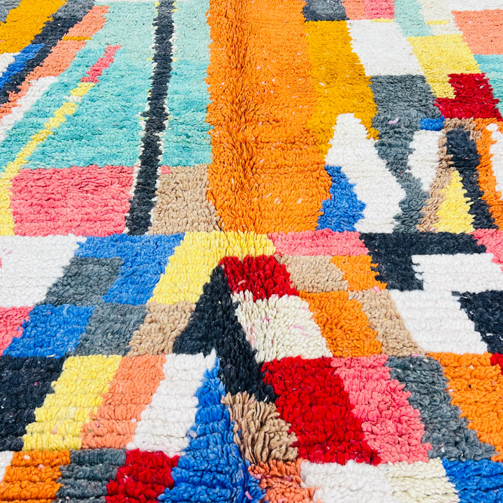 Colorful geometric vintage Moroccan Berber rug with magenta, saffron yellow, and blush pink accents, 260 x 163 cm.