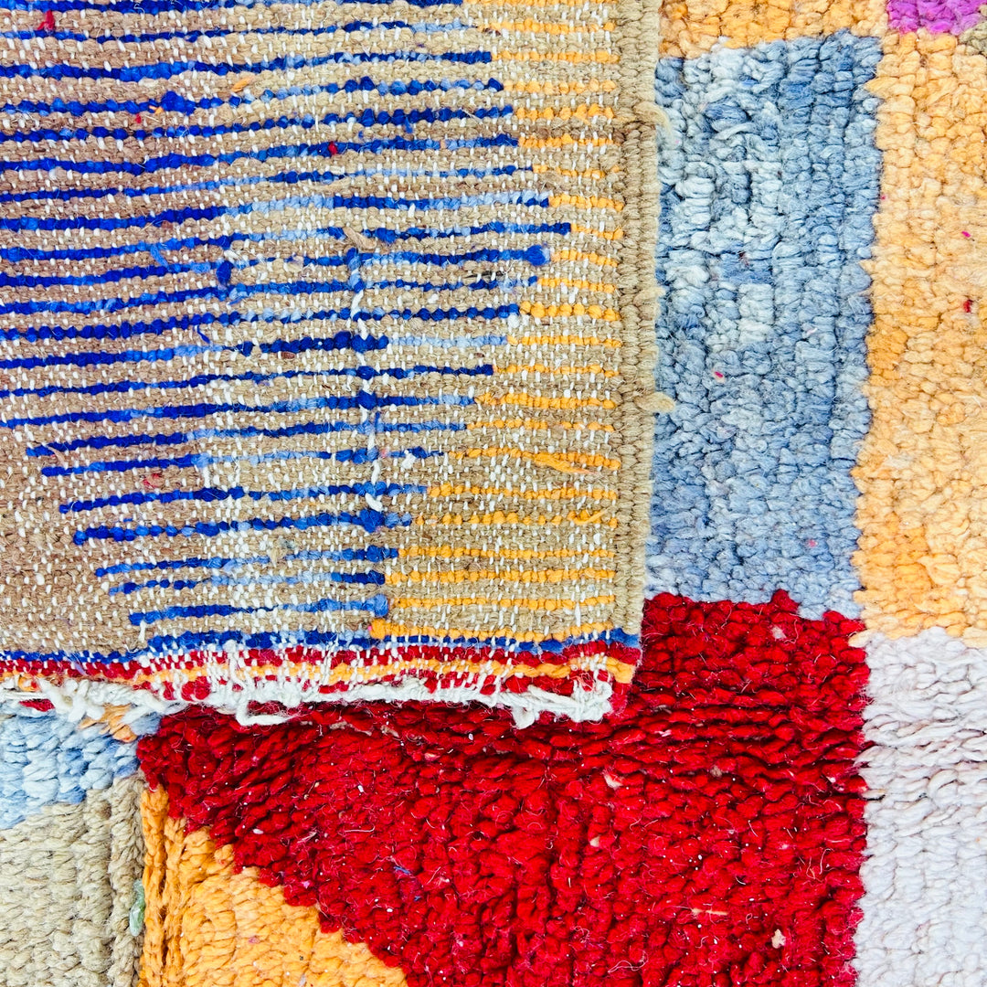 Vintage Moroccan wool rug No. 366 with geometric shapes in pink, orange, blue, and red – 245x160 cm

