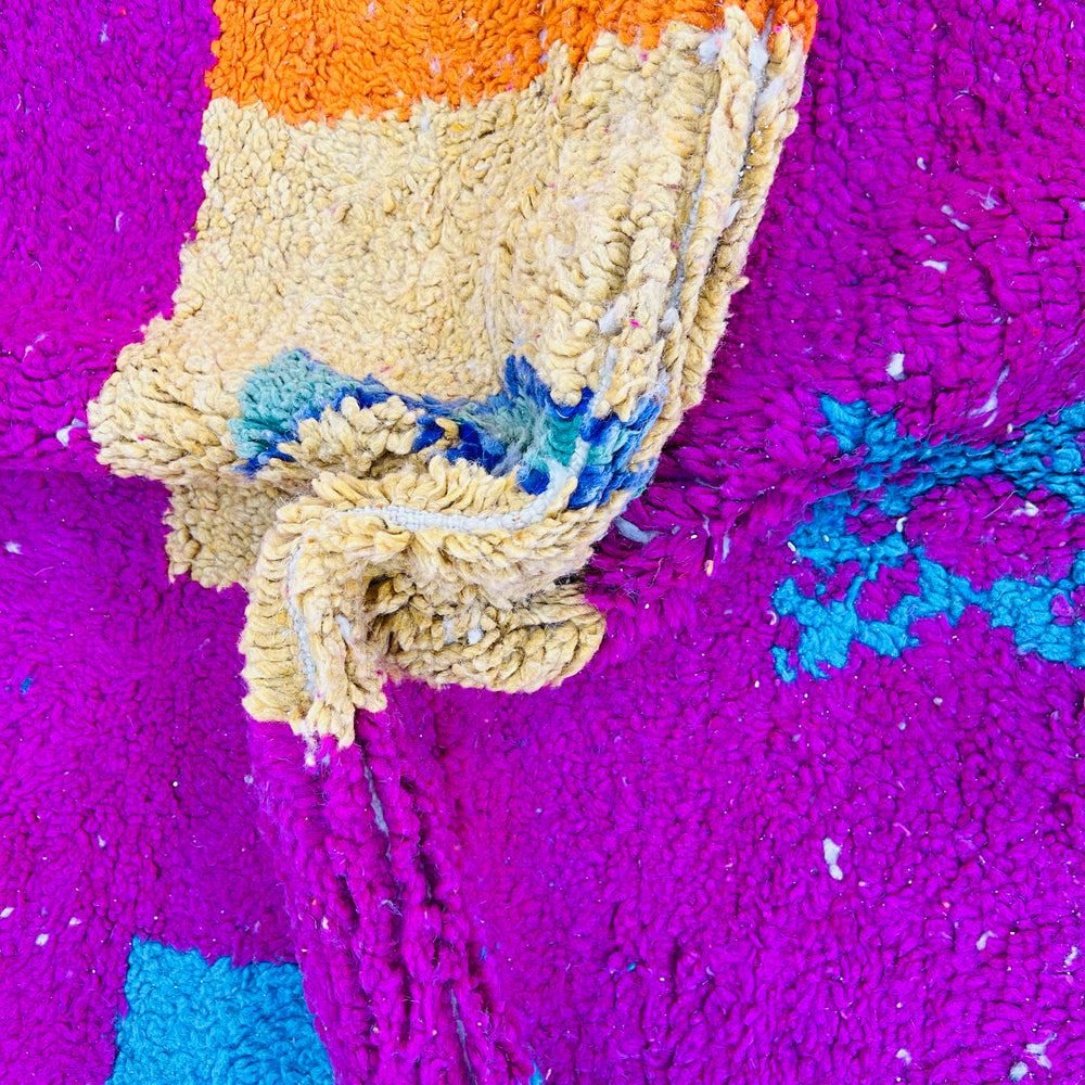 Vintage Moroccan wool rug with colorful Berber motifs in pink, orange, yellow, and teal – Rug 607, size 250x157 cm.

