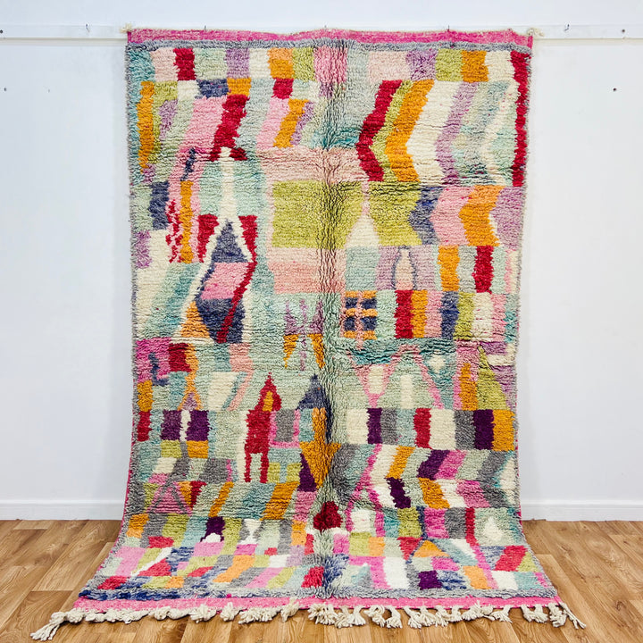 Colorful vintage Moroccan rug with geometric patterns, 250 x 156 cm, handwoven by Berber artisans, featuring vibrant wool colors.