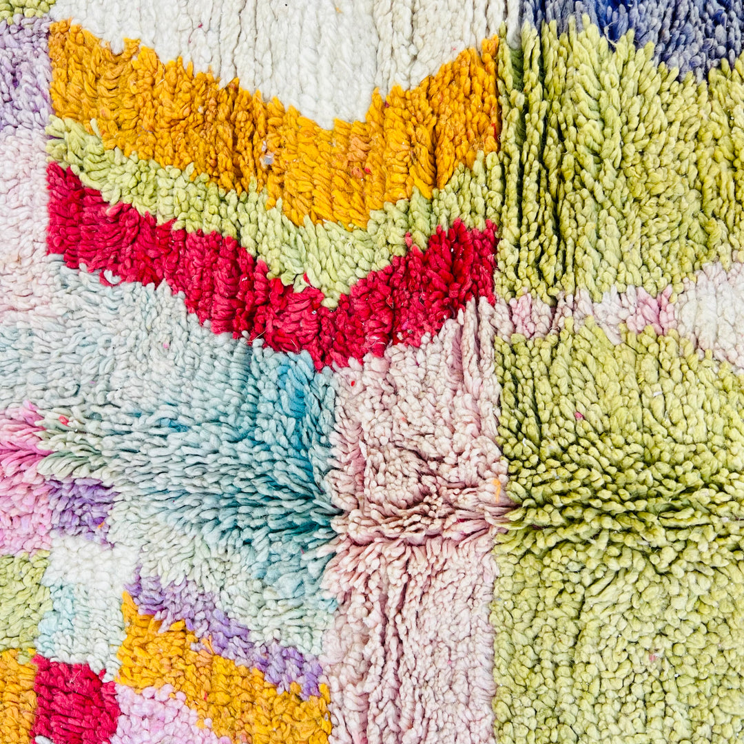 Colorful vintage Moroccan rug with vibrant geometric motifs in red, lilac, teal; handwoven wool by Berber artisans. 8.2 x 5.1 ft.