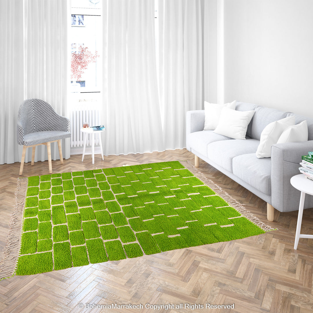 Handmade Moroccan rug in green checkered brick design, crafted from soft wool by Berber artisans
