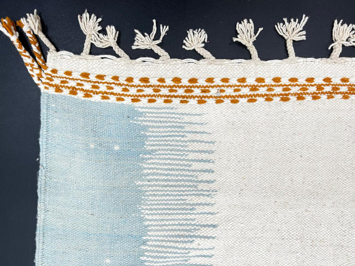 White Moroccan kilim runner rug with brown and blue abstract design, handmade flatweave wool rug for hallway and modern interior décor