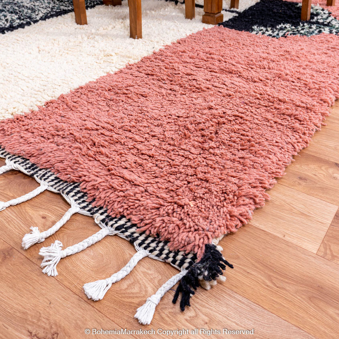 Colorful Moroccan Beni Ourain rug with diamond patterns, handmade from wool by Berber women