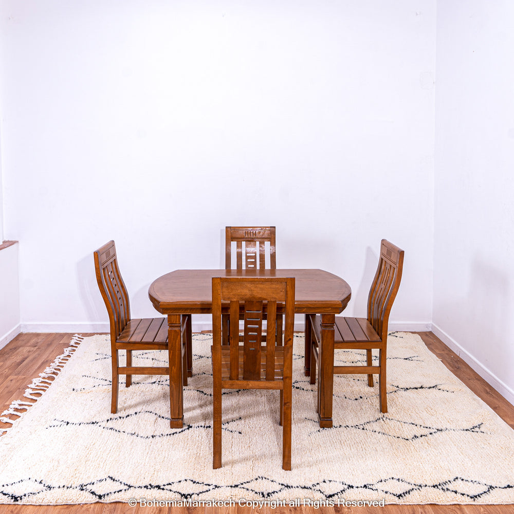 Handmade Beni Ourain Moroccan rug with black diamond pattern on ivory wool