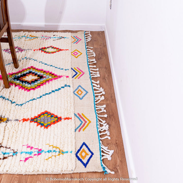 Colorful Moroccan wool shag rug in Berber tribal design, handmade in Morocco