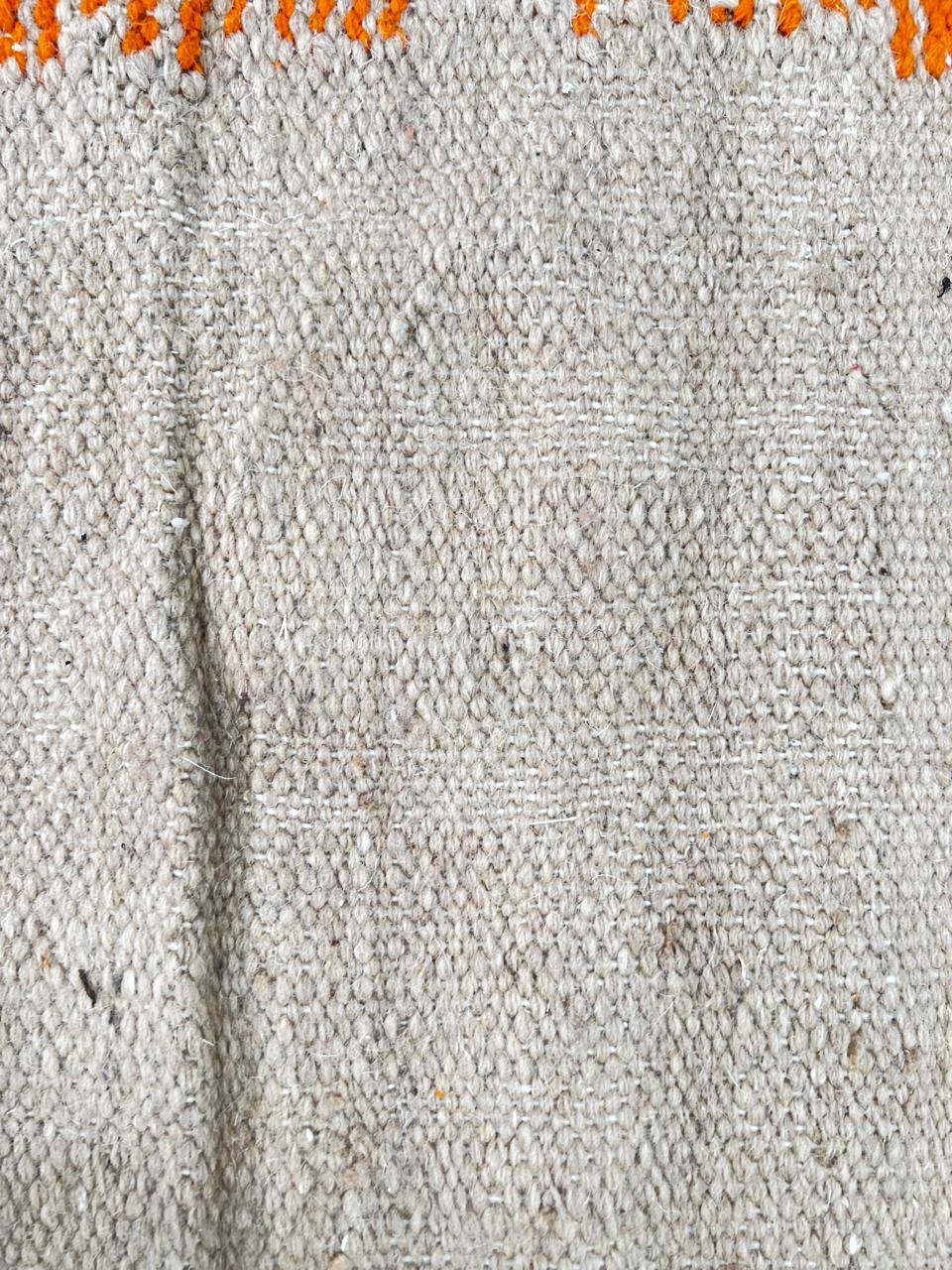 Handmade Moroccan runner rug with abstract orange design in beige and lavender tones, modern wool hallway rug