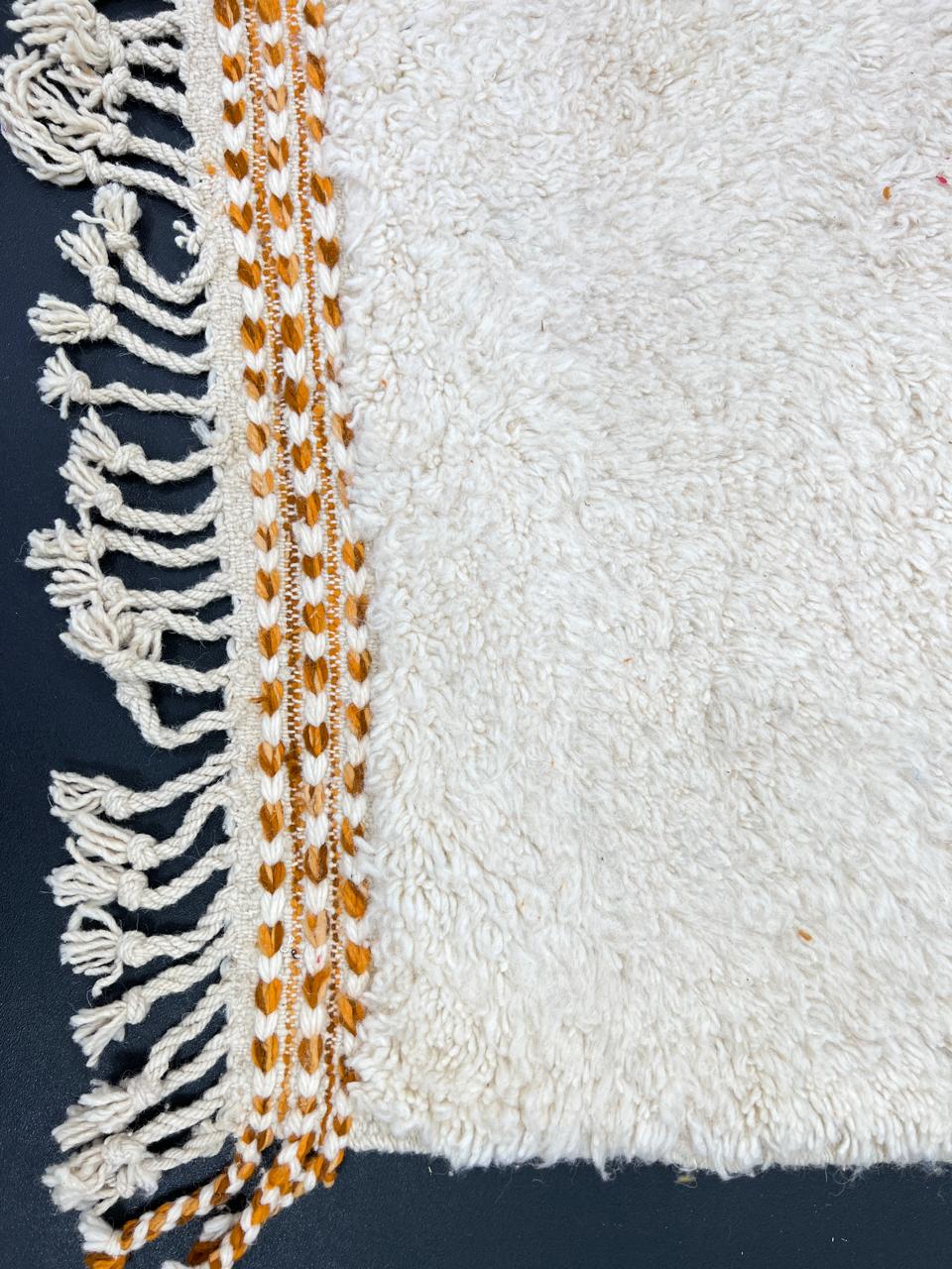 Orange and white handmade Moroccan wool rug with geometric block pattern