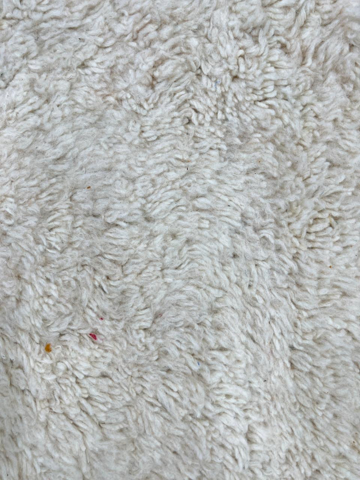 Orange and white handmade Moroccan wool rug with geometric block pattern