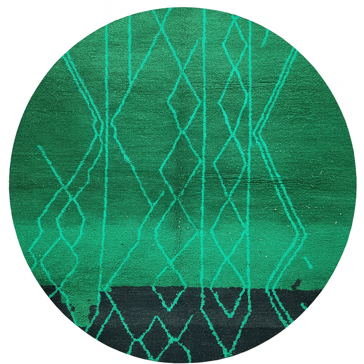 Round green Moroccan wool rug with modern Berber line patterns