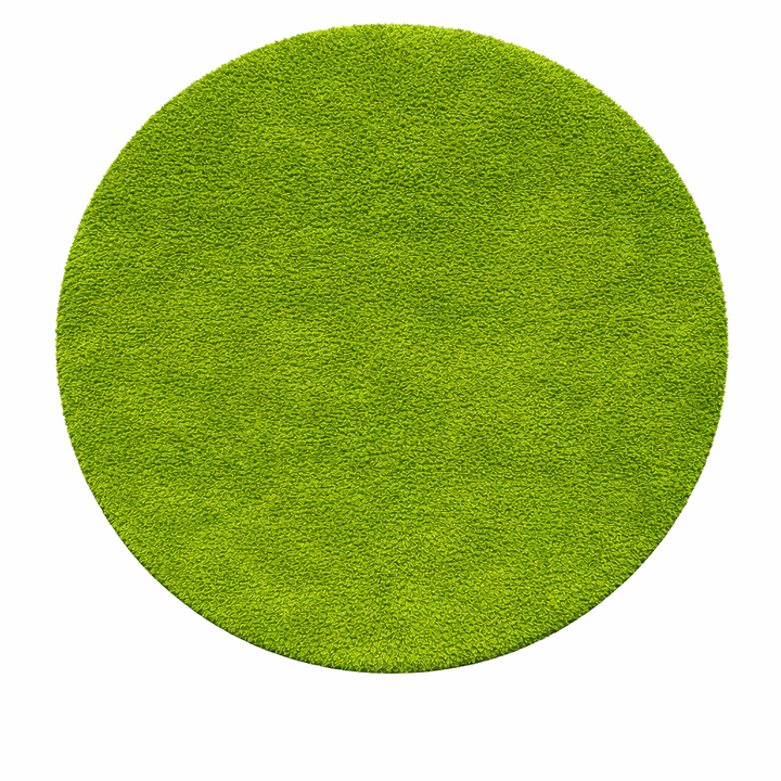 Round handmade Moroccan wool rug in a vibrant green shade, featuring a plush high-pile shag texture and minimalist solid-color design. Circular shape with a soft, cozy surface, perfect for modern
