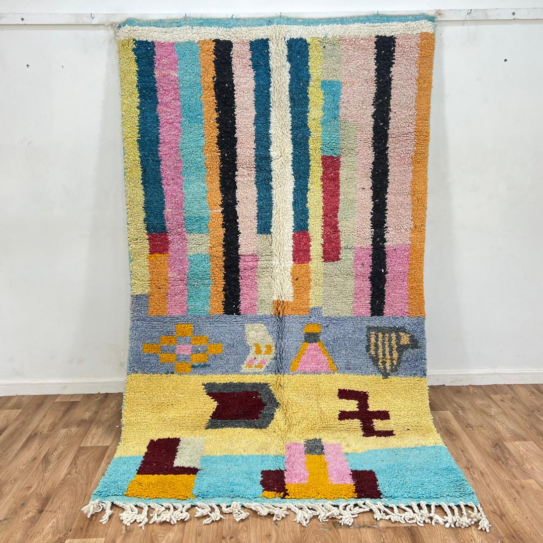 Vintage Moroccan wool rug with colorful vertical stripes and geometric Berber pattern, handmade in Morocco, size 253 x 155 cm.