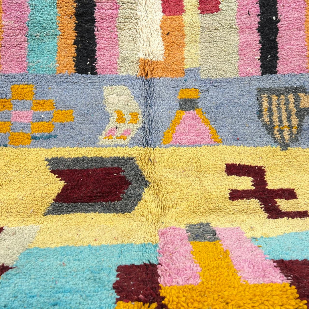 Vintage Moroccan wool rug with colorful vertical stripes and geometric Berber pattern, handmade in Morocco, size 253 x 155 cm.