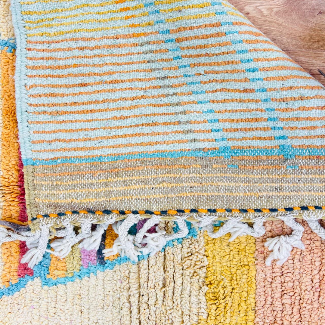 Vintage Moroccan wool rug with colorful abstract Berber pattern, handmade in Morocco