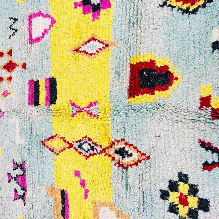 Vintage Moroccan wool rug with colorful Berber geometric symbols, handmade in Morocco