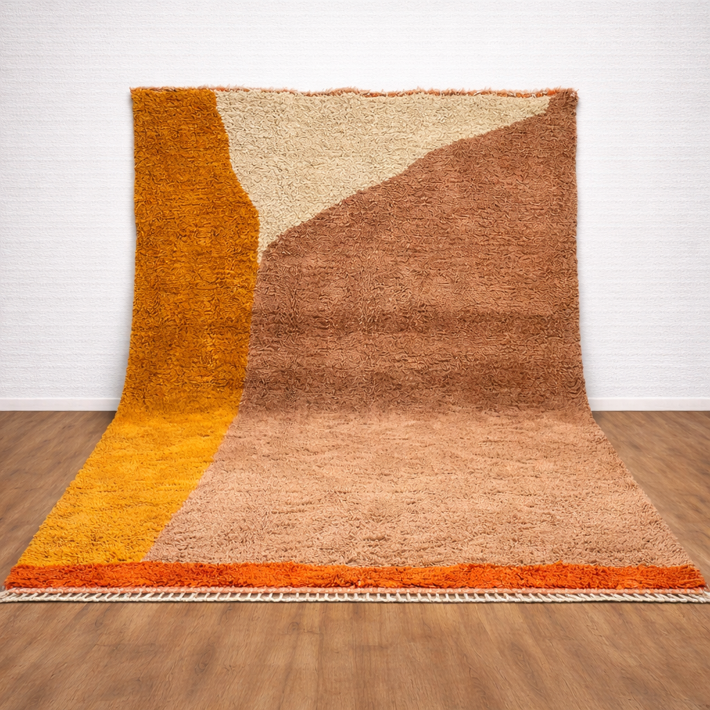 Handwoven Moroccan Beni Mrirt wool rug with an abstract geometric design in warm brown, beige, mustard yellow, and orange tones.