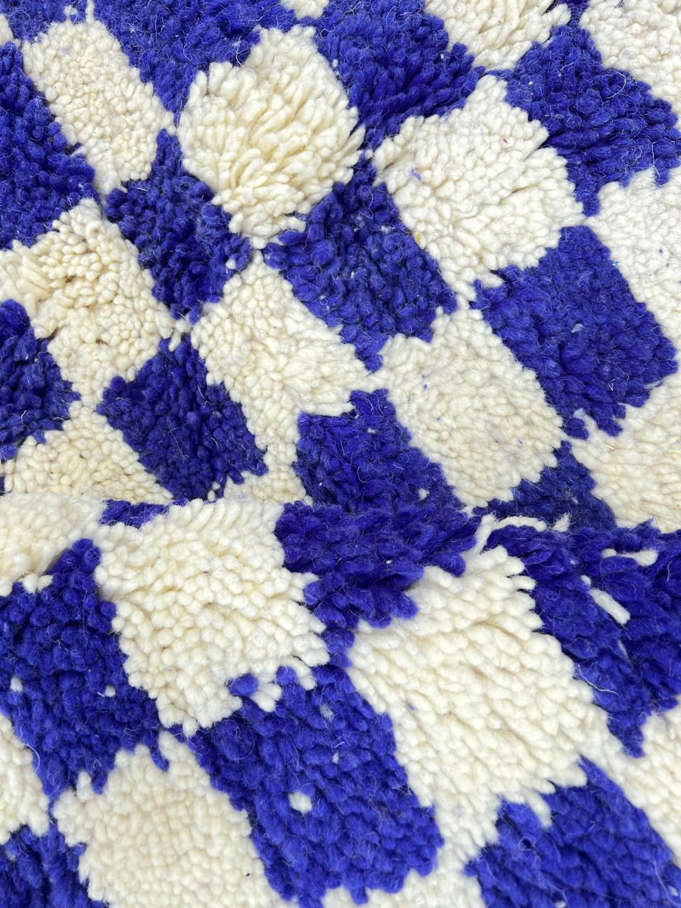 Blue and white checkered Moroccan wool rug, handmade by Berber artisans from 100% natural wool
