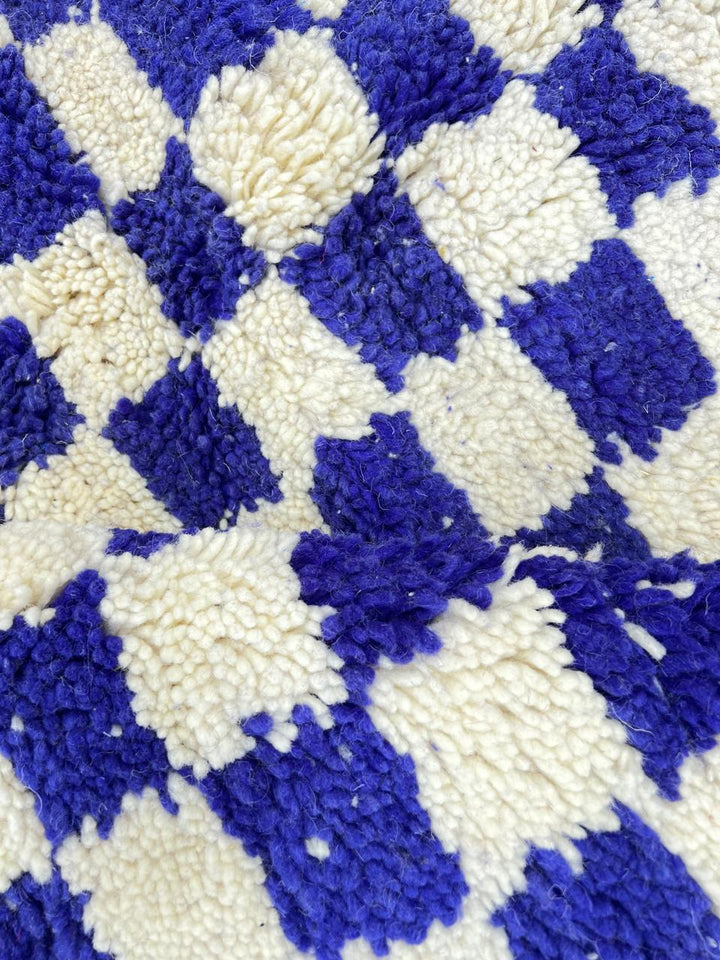 Blue and white checkered Moroccan wool rug, handmade by Berber artisans from 100% natural wool
