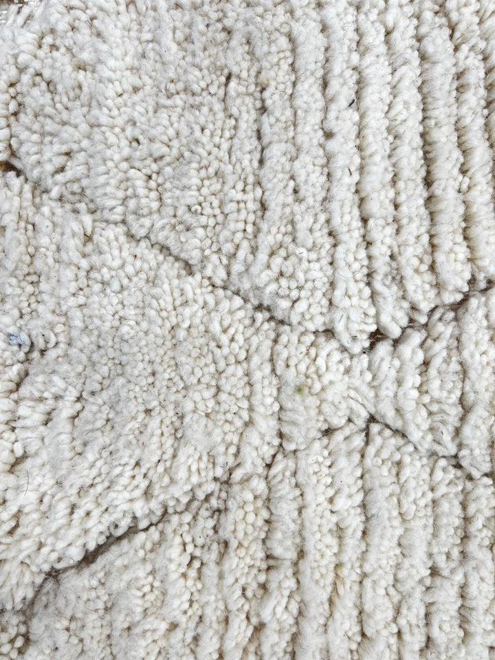 Handmade white Moroccan wool runner rug with subtle diamond Berber pattern