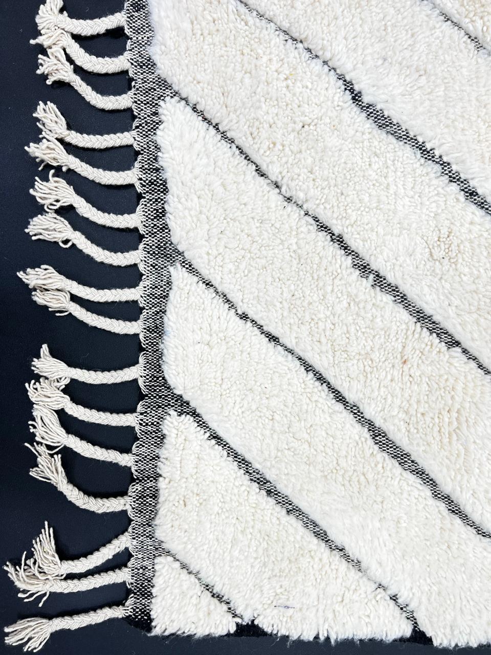 Handmade white Moroccan wool runner rug with charcoal chevron pattern
