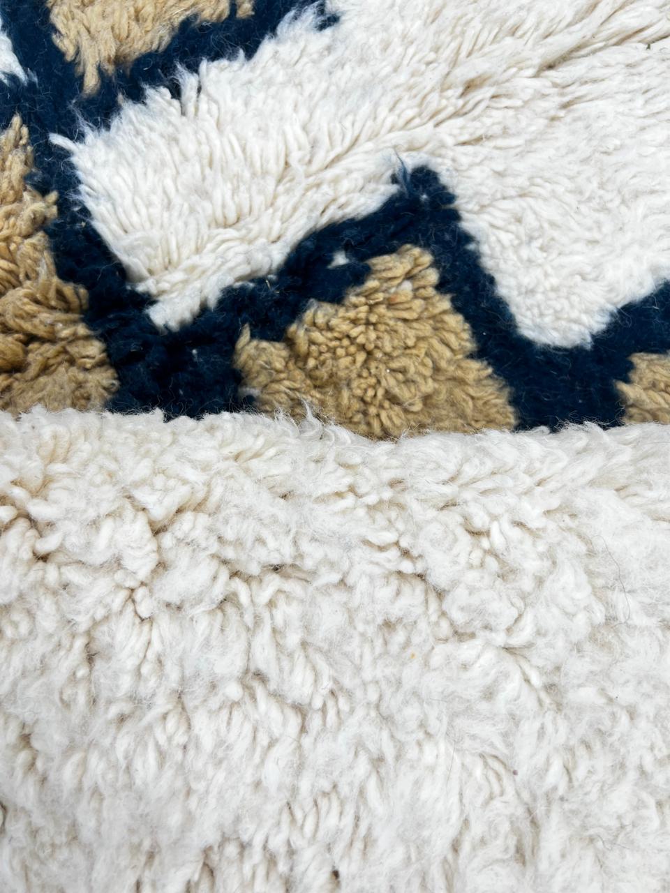 White Moroccan Berber runner rug with black and tan diamond motif, handmade wool hallway carpet with traditional tribal design