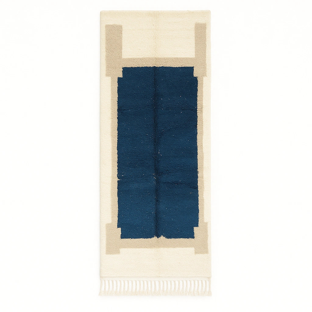 Handmade white and navy blue Moroccan wool runner rug with geometric border design