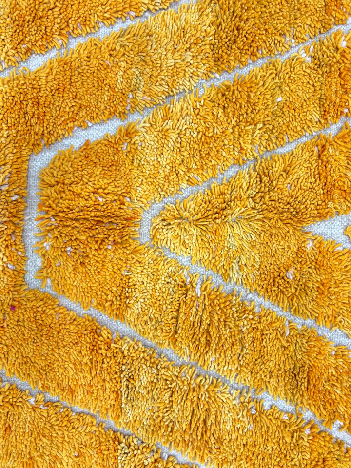 yellow moroccan wool rug with carved geometric berber lines high low texture handmade