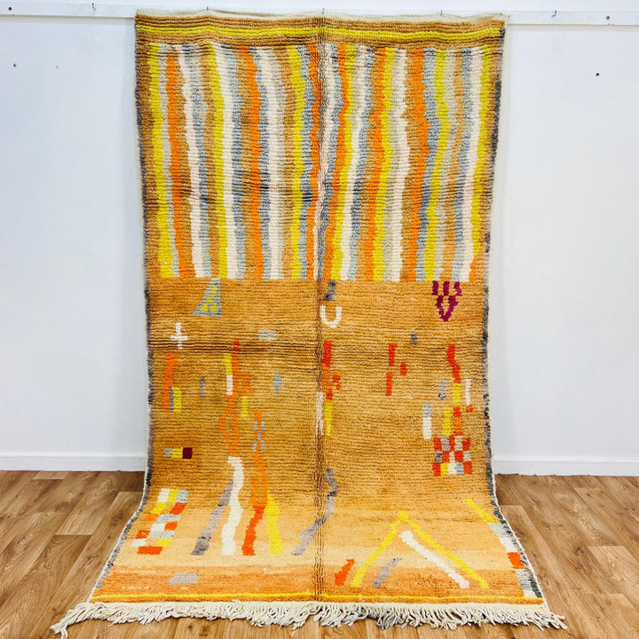 Vintage Moroccan wool rug with beige, orange and yellow abstract Berber pattern