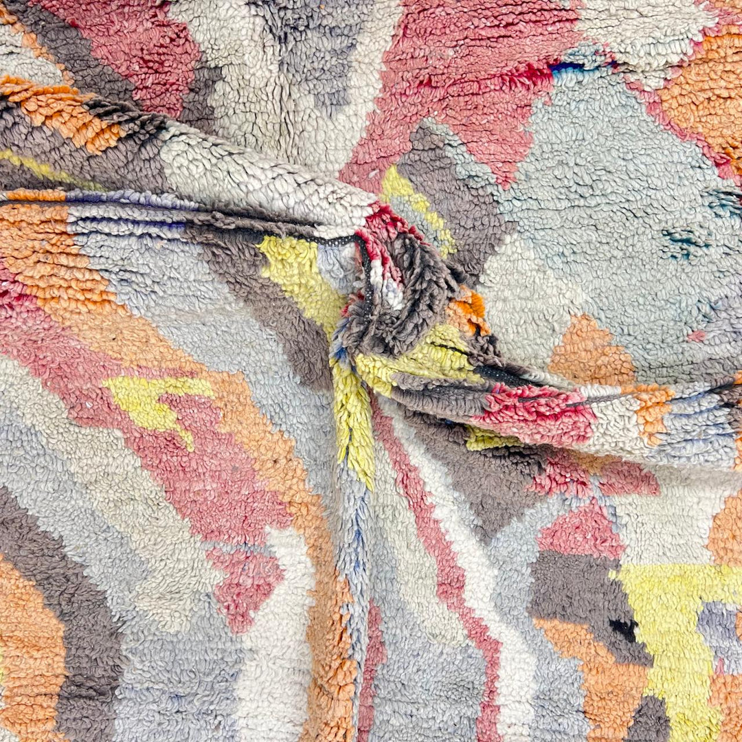 Vintage Moroccan wool rug 396 – handmade abstract earth tone design with yellow, coral, and beige pattern (256 × 148 cm).
